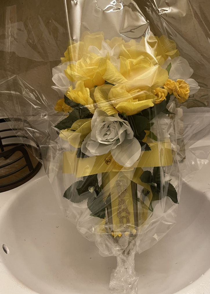 Wrapped floral memorial arrangement